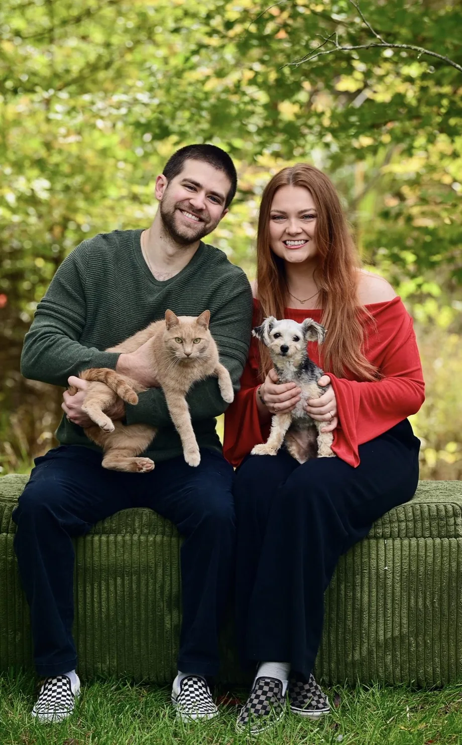 Kasey & Charlie with their cat and dog